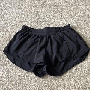 Lululemon Hotty Hot shorts low-rise 2.5 in. Color is black.